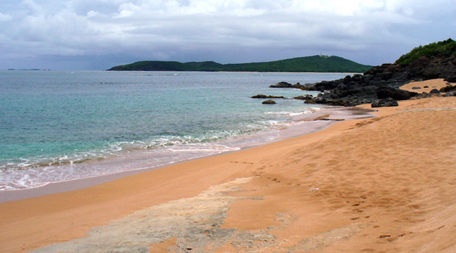 Playa Colorada is accessible from Seven Seas Beach through a path.